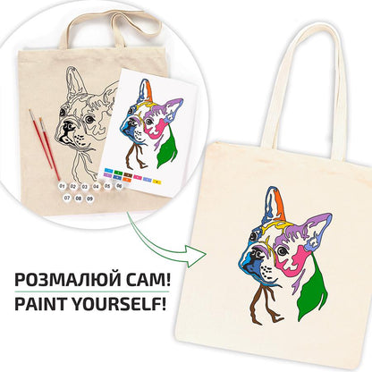 A cream-coloured tote bag featuring a colourful French bulldog design. The image shows a paint-by-numbers kit with a matching design, paintbrushes, and the text "PAINT YOURSELF!"